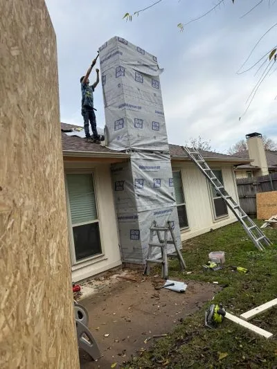 Chimney installation with insulation wrapping by Reliant Chimney Sweeps